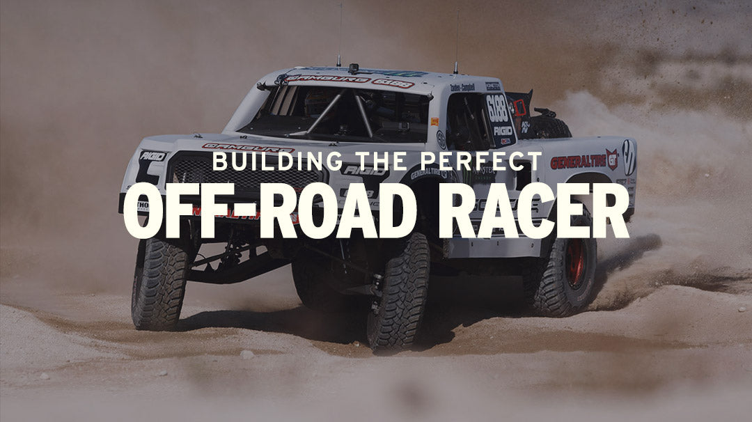jerry zaiden driving his trophy truck fast across the desert